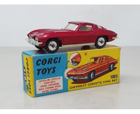 A boxed Corgi Toys No.310 maroon Chevrolet Corvette Sting Ray, box VG-E, model VG 