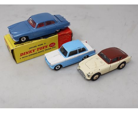 A boxed Dinky Toys No.142 metallic blue Jaguar Mk.10 with luggage case, box F, model E, a Dinky Toys No.189 Triumph Herald, P