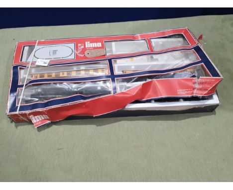 A Lima 00 gauge 'King George V' Locomotive and three Coaches in damaged box 