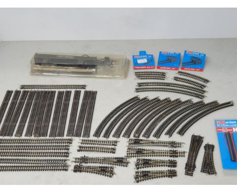 A box of Peco N gauge Set Track including Straights, Curves, Points, Tidy Track Cleaner, Buffers, Bachmann Controller and Gau