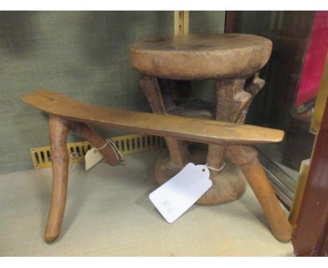 A hardwood tripod stool, Pokot people, Kenya, 45cm (17 3/4in) wide together with a Lega stool, 28cm high (2)  