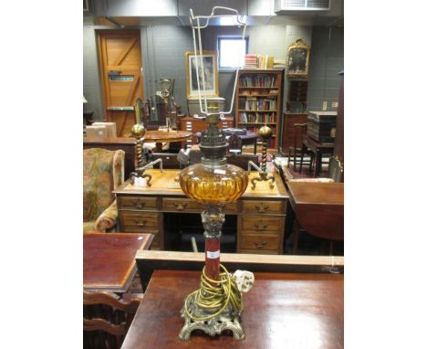 An oil lamp and two others converted to electricity, 86 cm high (3)  
