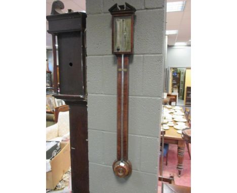 A late 18th century mahogany stick barometer  