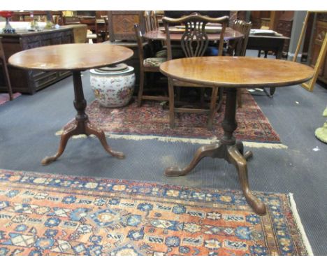 Two similar George III mahogany tripod tables (2)  