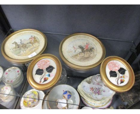 A pair of fox hunting scenes painted on cloth and a pair of pietra dura oval plaques  