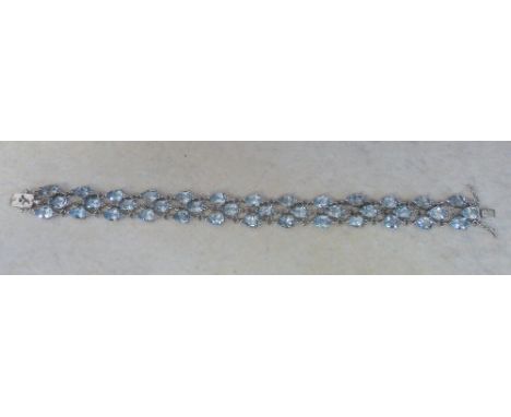 Sky Blue Topaz triple row sterling silver bracelet
