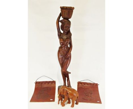 Modern carved wooden figure&nbsp;of an African woman, a carved wooden model&nbsp;of an elephant and calf and&nbsp;a pair of l
