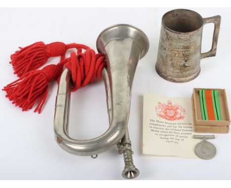 WW2 Defence medal in box of issue, white metal bugle and Africa campaign mug. 3 items 
