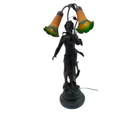 A bronzed resin art nouveau lamp base, with tiffany style coloured glass shade, 71cm high. 