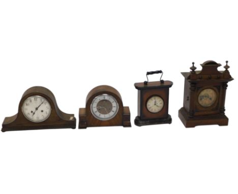 A quantity of clocks, to include a Vienna mantel clock, in walnut case, a Napoleons hat clock, etc. (4)