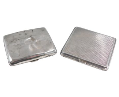 A George VI engine turned silver cigarette case, Chester 1937, and another silver cigarette case, 5.96oz overall. 