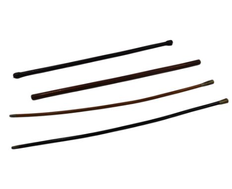 A Royal Artillery swagger stick, another swagger stick, and two leather clad swagger sticks. (4)