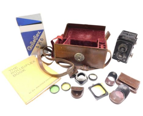 A Franke &amp; Heidecke Rolleiflex reflex camera, with Compur camera with Zeiss lens, boxed, and with some accessories and as