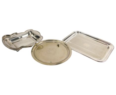 A rectangular silver plated tray, with engine turned decoration, 40cm wide, a pierced basket with swing handle, and a salver.