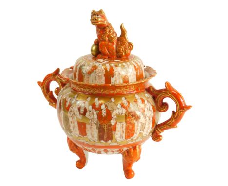 A Japanese Kutani Koro and cover, with kylin finial, the base decorated with figures and with scrolling handles and feet, 29c
