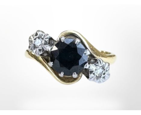 An 18ct yellow gold two stone diamond and sapphire ring, size  L, 4.1g.