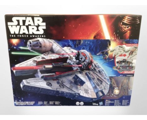 A Hasbro Star Wars The Force Awakens Millennium Falcon model, boxed