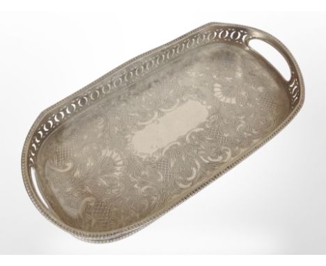 A silver-plated pierced and engraved gallery tray, width 32cm.