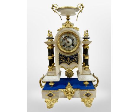 A 19th century French alabaster and gilt metal mantel clock, striking on a bell, with key, height 45cm.  