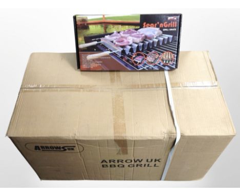 A box of forty six Arrow Sear 'N Grill BBQ grilling grates 