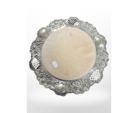 A pierced silver-plated serving dish with inset wooden panel, diameter 31cm.