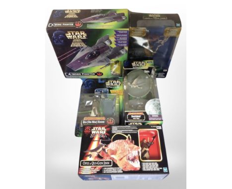 Five Kenner and Hasbro Star Wars figures, boxed.