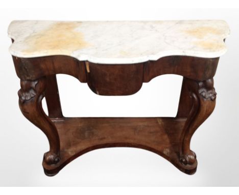 A Victorian carved mahogany serpentine front console table with white marble top, 122 cm x 53 cm x 75 cm 