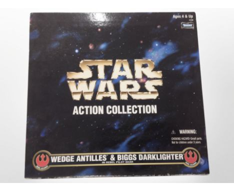 A Kenner Star Wars Action Collection figure, Wedge Antilles and Biggs Darklighter in Rebel pilot gear, boxed. 