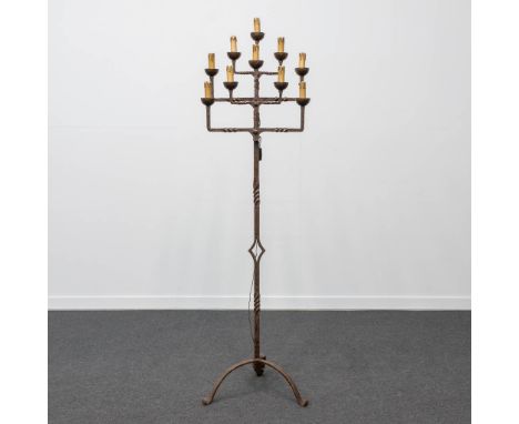 A Wrought iron candlestick with 10 points of light, which has been transformed to standing lamp. 45 x 47 x 162