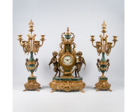 Empire style three piece-mantle clock with green marble, Half hour and hour striking movement. Made around 1970-1980. 67
