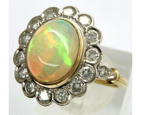 18ct gold opal and diamond cluster ring, size Q, 6.6g. P&amp;P Group 1 (£14+VAT for the first lot and £1+VAT for subsequent l