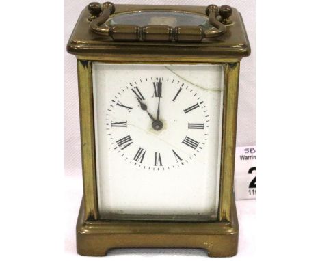 French brass carriage clock, H: 11 cm, working at lotting, crack to enamel face. P&amp;P Group 1 (£14+VAT for the first lot a