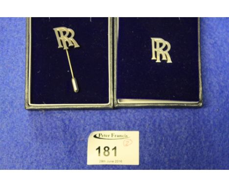 Silver Rolls Royce tie pin in box and matching lapel pin.  (2)