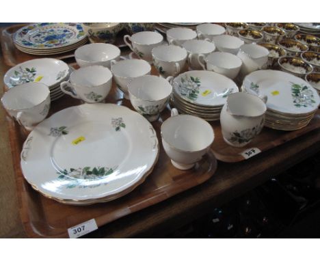 Two trays of Royal Stafford fine bone china 'Camellia' teaware comprising: teacups and saucers; milk jug; sucrier and various