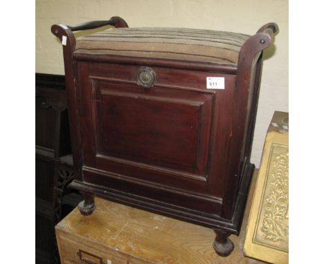 20th Century stained upholstered stool with pull out magazine rack.