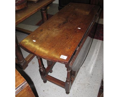 19th Century oak gate legged table.