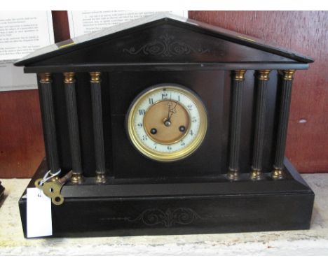 Late 19th Century black slate architectural two train mantel clock.
