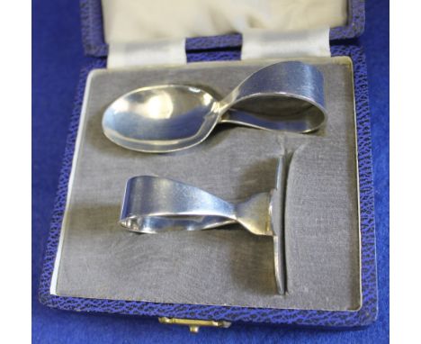 Cased two piece silver Christening set, comprising caddy spoon and baby's pusher in original Mappin and Webb box, Sheffield h