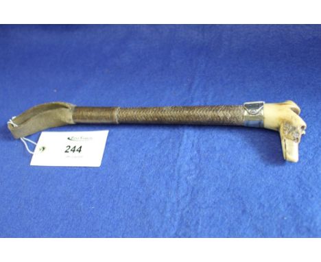 Hunting crop with fox head terminal, white metal buckle design collar marked: Ashford, maker, with whistle top.