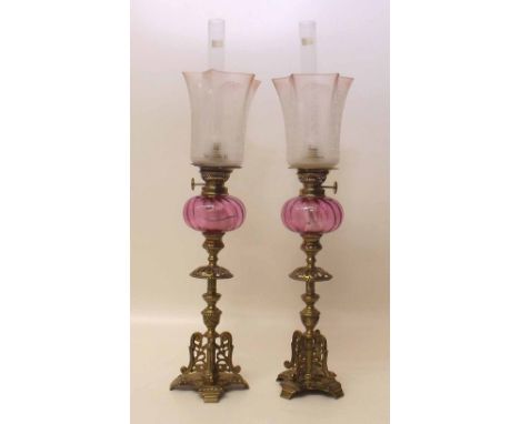 Pair of 19th century French oil lamps with ruby glass reservoirs. Condition report: see terms and conditions