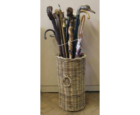 Wicker stick bin containing a variety of walking Condition report: see terms and conditions