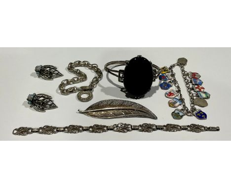 A Thomas Sabo silver bracelet; a silver and enamel charm bracelet; etc