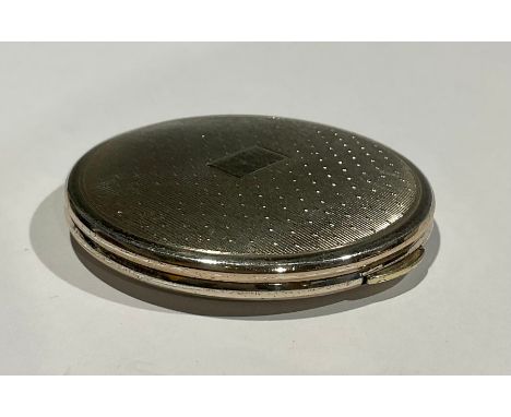 An Elizabeth II silver Kigu powder compact, London 1964