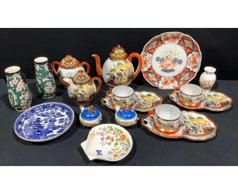 A Japanese Meiji shaped plate, hand painted in the Imari manner, 22cm diameter, c. 1910; a pair of Royal Doulton vases, dogwo