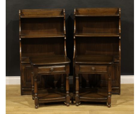 A pair of Ercol waterfall bookcases; a pair of Ercol lamp tables (4)