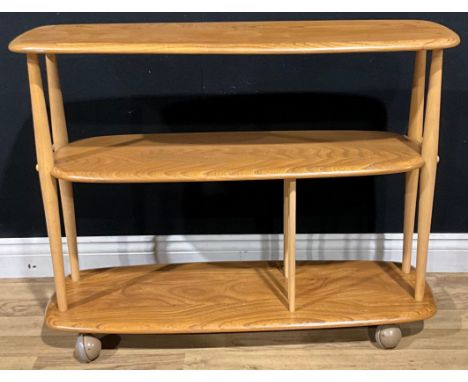 An Ercol ‘Baby Giraffe’ trolley bookcase, 71cm high, 91cm long, 32cm deep