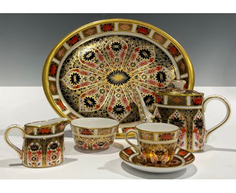 A Royal Crown Derby 1128 Imari pattern miniature cabaret tea service, the tray 19cm long, first quality
