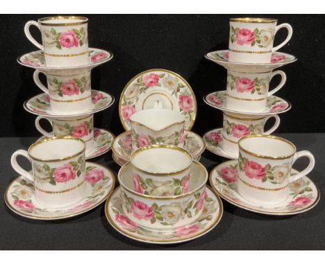 A Royal Worcester Royal Garden pattern part coffee set, comprising nine coffee cups, eleven saucers, cream jug, sugar bowl, a