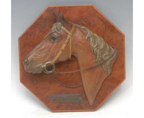 An Art Deco period Austrian cold painted bronze plaque, cast as the head of a racehorse, indistinctly signed, foundry mark, t