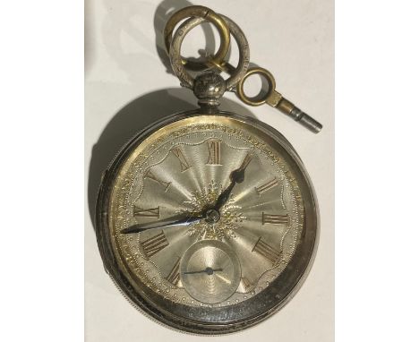 A Victorian silver open face pocket watch, engine turned case and silvered dial, Roman numerals in raised gilt, subsidiary se